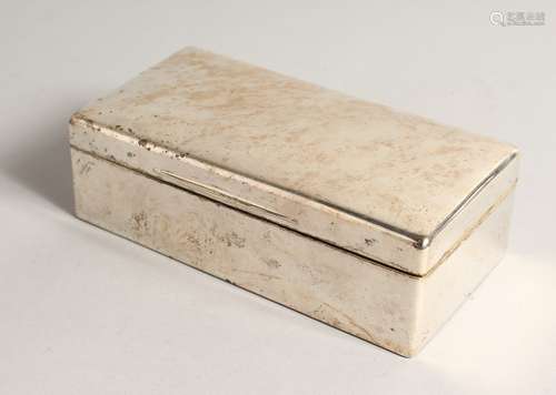 A PLAIN RECTANGULAR SILVER CIGARETTE BOX, London 1905, 7ins ...