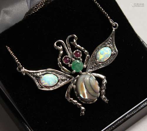 A PAIR OF SILVER OPAL SET BUTTERFLY PENDANT and chain