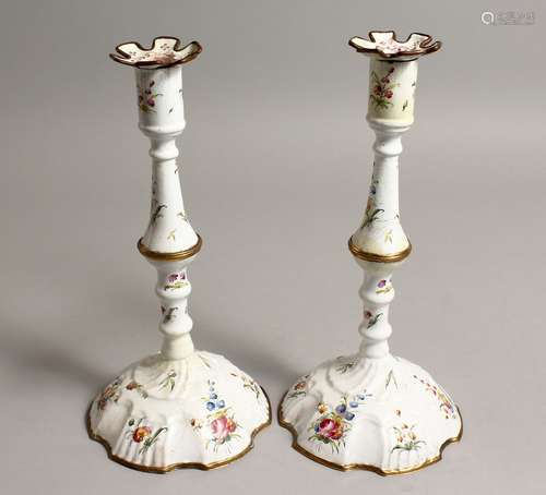 A PAIR OF BILSTON ENAMEL CANDLESTICKS painted with flowers 1...