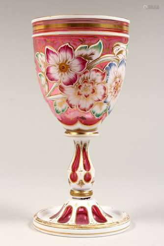 A BOHEMIAN COLOURED OVERLAY GOBLET 7.25ins high.