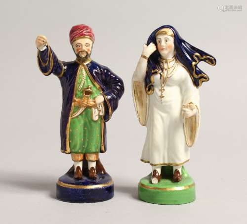 A SMALL PAIR OF FIGURES, TURKISH MAN AND LADY 5.5ins high.