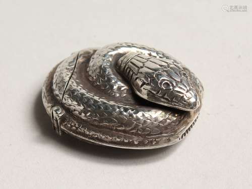 A SILVER SNAKE VESTA