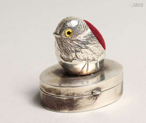 A SILVER CHICK PIN CUSHION