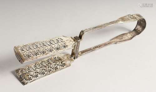 A PAIR OF SILVER ASPARAGUS SERVERS, with shell cast handles ...