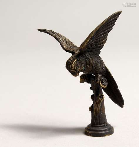 A NOVELTY BRASS PARROT PIPE TAMPLER