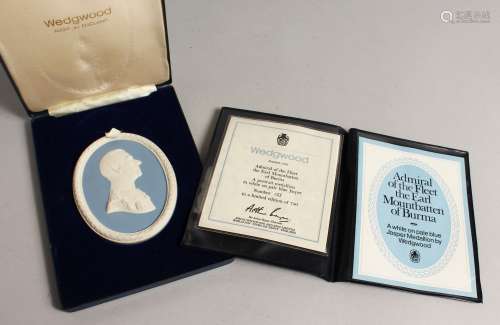 A WEDGWOOD BLUE AND WHITE OVAL PLAQUE 