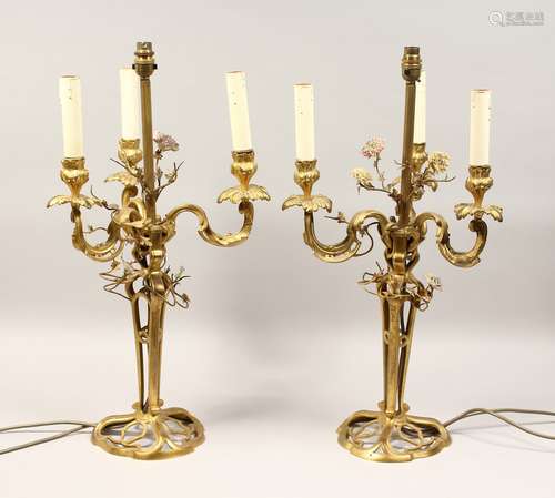 A GOOD PAIR OF FRENCH BRONZE THREE BRANCH CANDELABRA with sc...