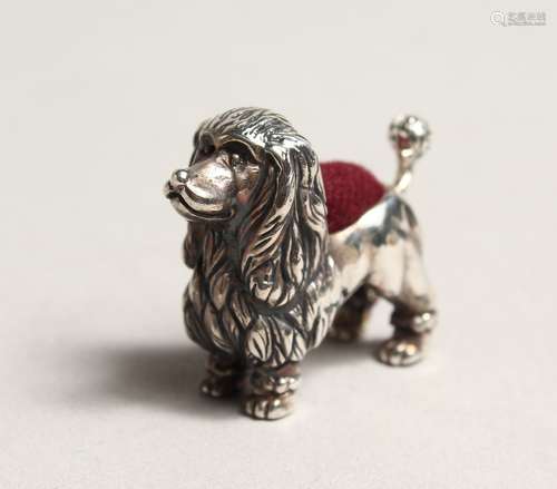 A NOVELTY SILVER POODLE PIN CUSHION