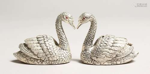 A PAIR OF .925 SILVER PLATED SWAN SALT AND PEPPERS