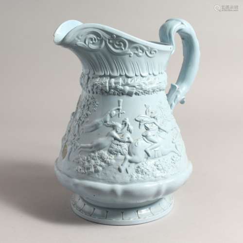 A RIDGWAY TURQUOISE POTTERY JUG with figures in relief. 11in...
