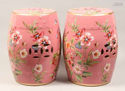 A PAIR OF CHINESE PORCELAIN BARREL SEATS, pink ground decora...