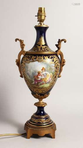 A 19TH CENTURY SEVRES BLUE GROUND TWO HANDLED VASES, convert...