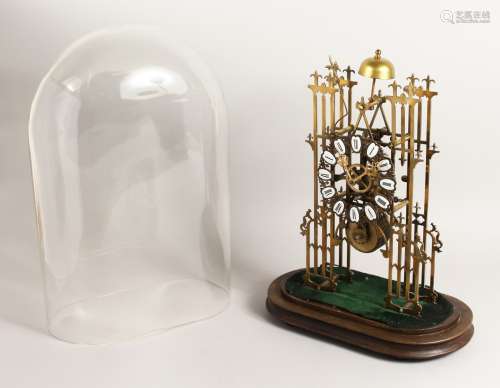 A VERY GOOD BRASS SKELETON CLOCK CATHEDRAL SHAPED, striking ...