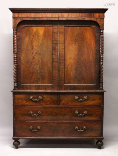 A 19TH CENTURY LINEN PRESS, with a moulded cornice above a p...