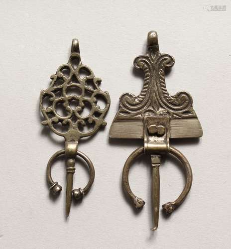 TWO SMALL ISLAMIC SILVER HEAD PIECES.