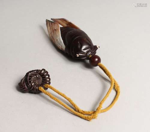 A JAPANESE CARVED WOOD AND MOTHER OF PEARL FLY INRO.