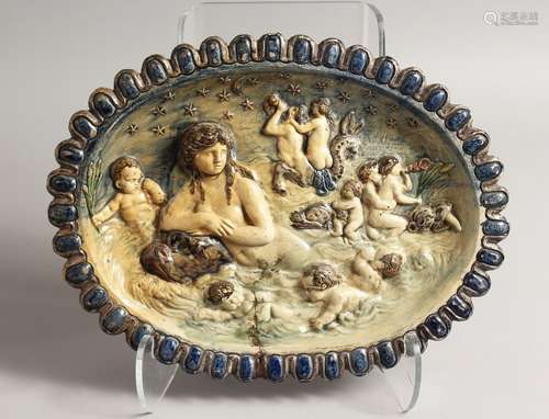 A 17TH - 18TH CENTURY MAJOLICA OVAL DISH with blue border, t...