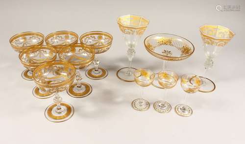 A GOOD SET OF SIX GILDED CHAMPAGNE GLASSES with ribbon motif...