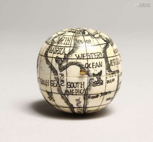 A SMALL BONE FOLDING GLOBE COMPASS.