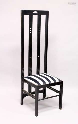 AN UNUSUAL BLACK LACQUER, OVERSIZED HIGHBACK CHAIR, in the m...