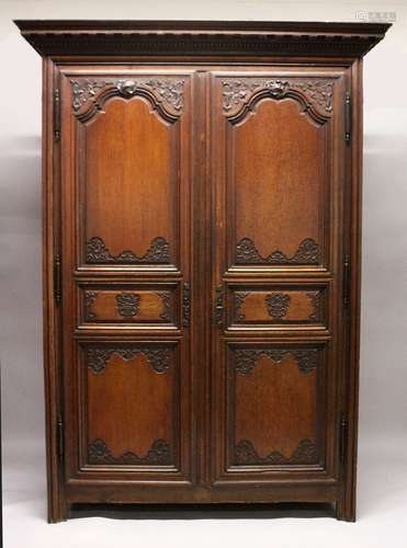 A GOOD LARGE 19TH CENTURY FRENCH OAK TWO DOOR ARMOIRE, with ...