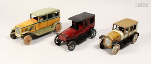 THREE EARLY TIN PLATE CARS.