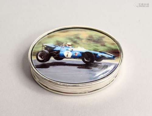 AN OVAL SILVER RACING CAR PILL BOX