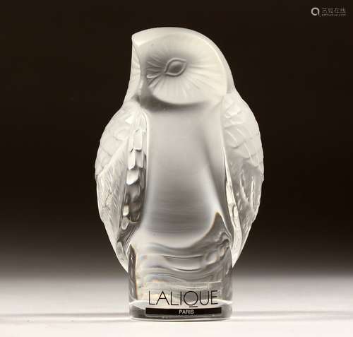 A LALIQUE GLASS OWL, engraved Lalique, France, in a fitted b...