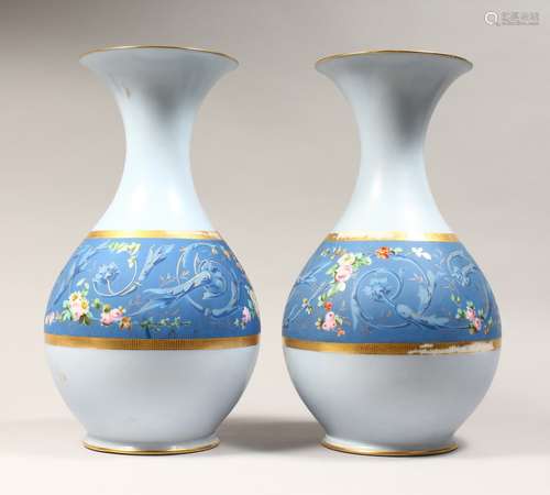 A LARGE PAIR OF CONTINENTAL LIGHT BLUE BULBOUS VASES, painte...