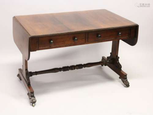 A GOOD REGENCY ROSEWOOD SOFA TABLE, with folding flaps, two ...