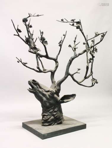 A LARGE AND UNUSUAL CAST BRONZE SCULPTURE, modelled as a dee...