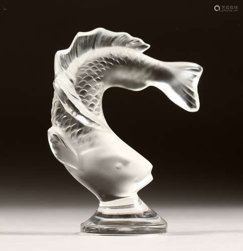 A LALIQUE GLASS SALMON, engraved Lalique, France, in a fitte...