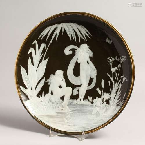 A GOOD PATE SUR PATE CIRCULAR DISH with classical figures in...