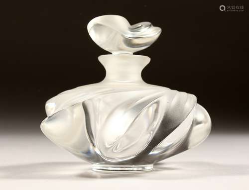 A LALIQUE GLASS SCENT BOTTLE with stopper, engraved Lalique,...