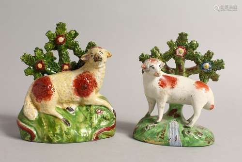 TWO STAFFORDSHIRE BOCAGE GROUPS OF A SHEEP with Bocage backs...