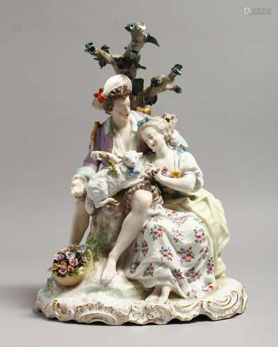 A LARGE 19TH CENTURY GERMAN PORCELAIN GROUP, boy and girl wi...