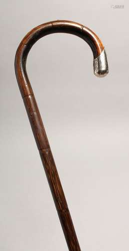 A WALKING STICK with silver handle London 1916, 36ins long