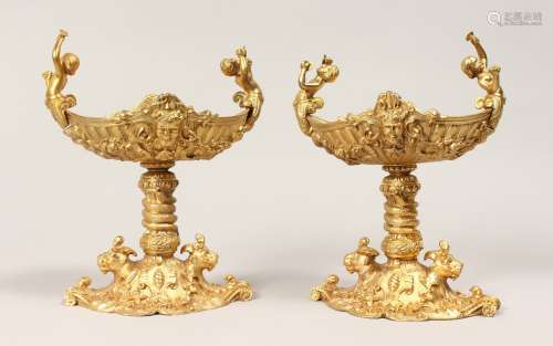 A PAIR OF GILT BRONZE CLASSICAL STYLE PEDESTAL TABLE SALTS. ...