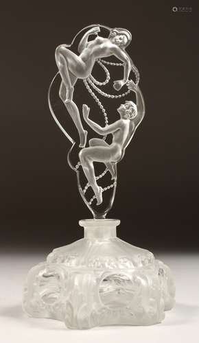 A GLASS SCENT BOTTLE AND STOPPER IN THE LALIQUE STYLE. 8.5in...