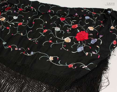 AN EMBROIDERED SHAWL