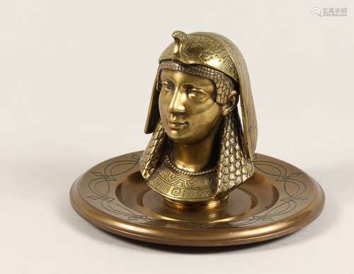 AN EGYPTIAN REVIVAL BRASS INKWELL