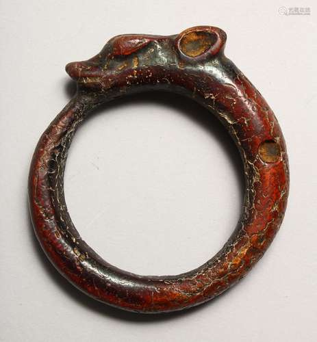 A CARVED CHINESE HORN BANGLE