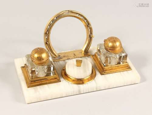 A 1930'S ONYX AND GILT METAL HORSE RACING INKSTAND with hors...