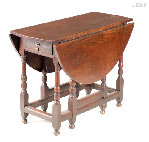 AN 18TH CENTURY OAK GATE LEG TABLE OF SMALL SIZE with