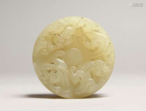 A CARVED CIRCULAR JADE BOX AND COVER 2.25ins diameter