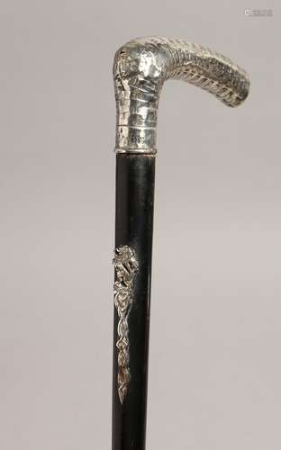 A WALKING CANE with .800silver handle encscribed 