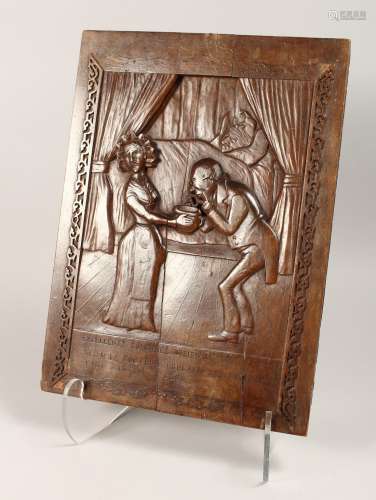 A GOOD CARVED WOOD PANEL 16ins x 11.5ins.