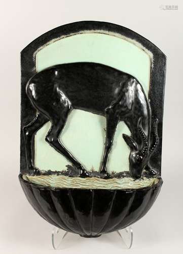 A LARGE ART DECO POTTERY WALL POCKET.