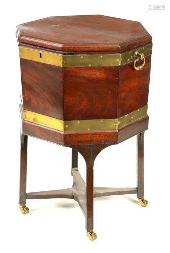 A GEORGE III MAHOGANY OCTAGONAL CELLARETTE with hinged