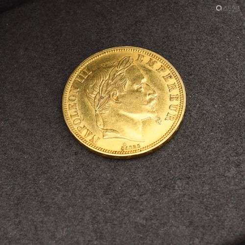 Pièce de 50 Francs au profil de Napoléon III, datée de 1863....
